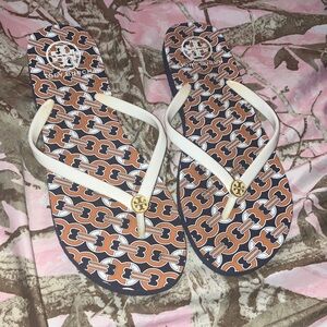 Tory Burch White Strap Flip Flops with Orange & Navy Chain Print